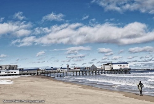 Do you agree?This image reminds me of an old school postcard. The way the surfer is dressed makes it