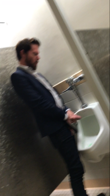 hobartgloryhunter:  gloryholecam:Don’t know why this didn’t post the 1st time. Super hot, bearded, suited, hairy, tatted and lean guy. Jerking it at the urinals. Said no to me blowing at first but as soon as he weakened I jumped down there and he