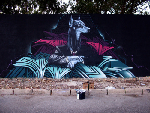 crossconnectmag:  Street art by Kraser  Spanish street artist, Kraser Tres, dresses our walls with bizarre tales, using a post-surrealistic language which can talk to everyone. Coming from Cartagena, his art tells absorbing stories. He distorts childish