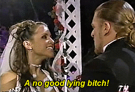 a-smile-in-hell:rosadellic:Triple H and Stephanie McMahon renew their weddings vows (2/11/2002)Lol a