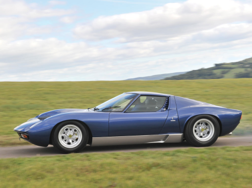 45-9mm-5-56mm:  megadeluxe:  1971 Lamborghini Miura P400 S  One of my favorite sports cars of all time. Timeless design.   Best looking design ever produced.  Not my favorite color for a Miura but it doesn’t hold it back much.