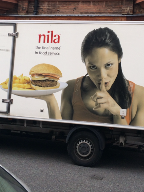 Saw this truck in London. Why is she shushing? Did she steal the burger?