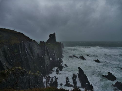 destroyed-and-abandoned:  Dún an Óir, weathering another Atlantic storm. Cape Clear, Ireland via IceBean