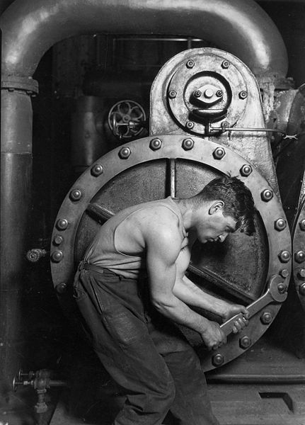 Power house mechanic working on steam pump, 1920 by Lewis W. Hine