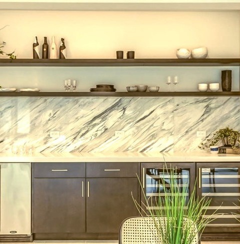 Home Bar - Modern Home Bar
Home bar - large modern u-shaped home bar idea with an undermount sink, flat-panel cabinets, dark wood cabinets, granite countertops, multicolored backsplash, marble backsplash and multicolored countertops