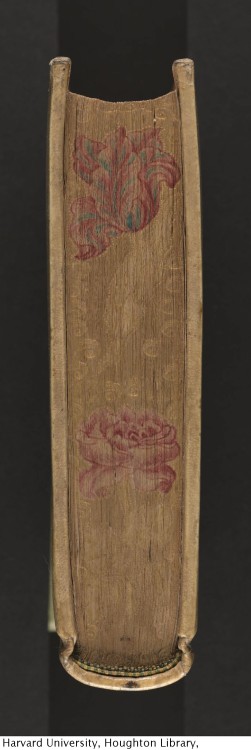 A book with its edges decorated in embossed gold (known as &ldquo;gauffering&rdquo;) and painted in 