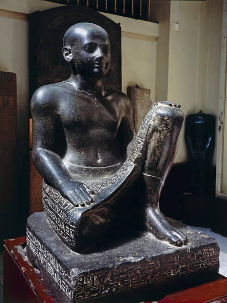 Statue of vizier HorThis vizier is shown seated with one leg bent up against his chest and the other