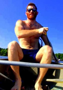 realmenstink:  HOT RED BEARD IN A CANOE !!!