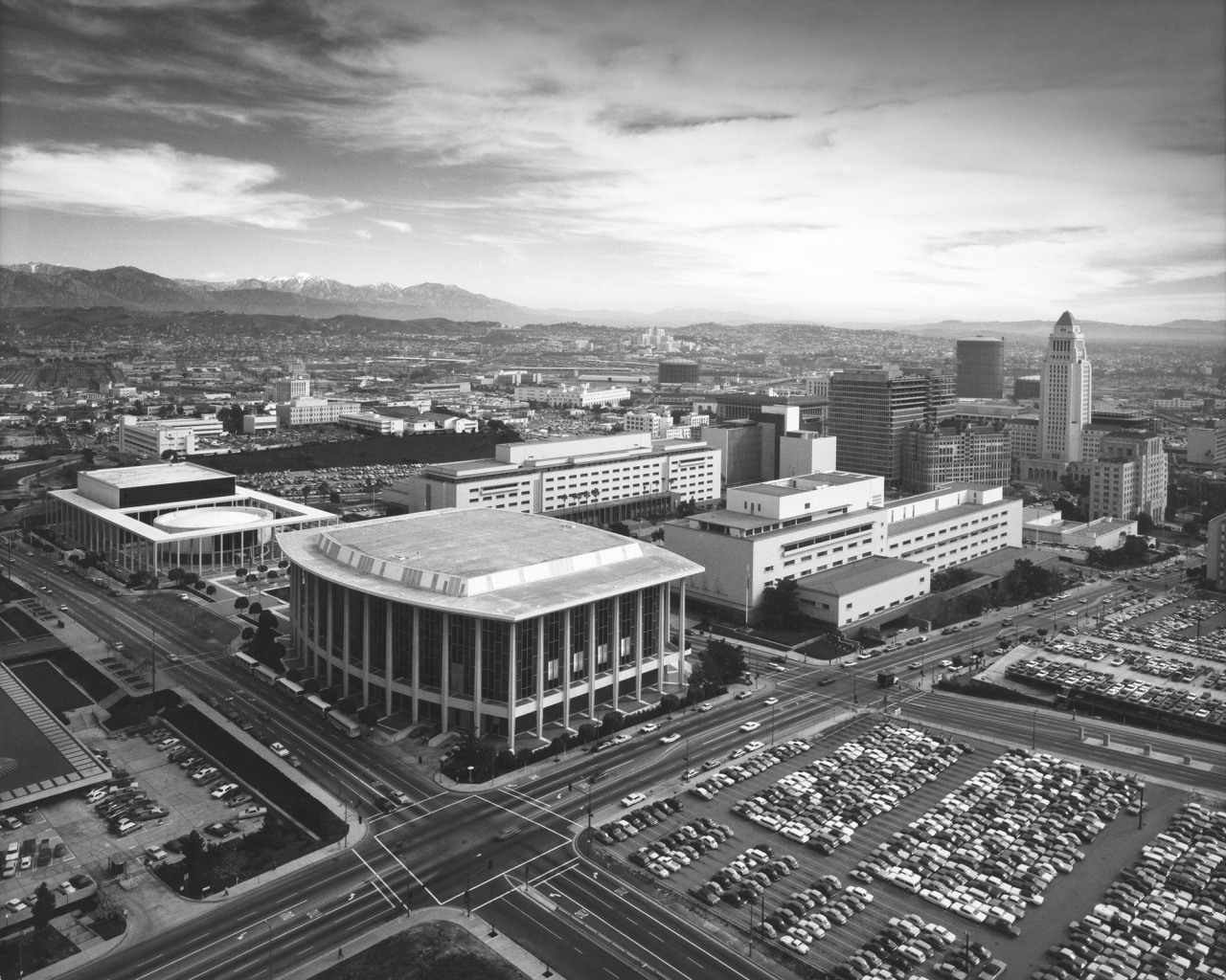 Here is a view of 1970’s downtown L.A. (you can see City Hall poking out of the crowd on the right side) as buildings were getting taller, and taller, and taller. For a view that really shows this little developed area as an island, look what The...