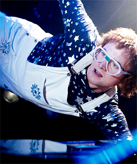 Elton John’s fashion in Rocketman (2019)Costume Design by Julian Day