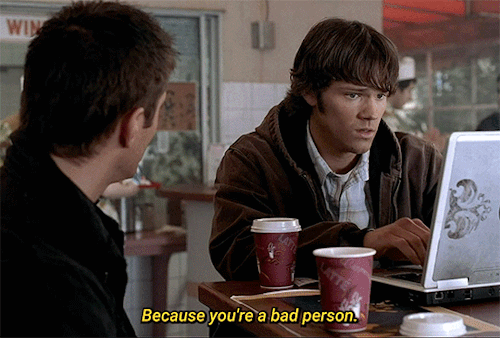 supernatural s1e17 sam and dean at the rodeo drive-in sitting at a high top table. sam at the laptop, they're discussing how tulpas work. sam replies without looking at dean, dean raises his eyebrows as he considers sam's answer and gives a little look of touché

sam: Because you're a bad person.