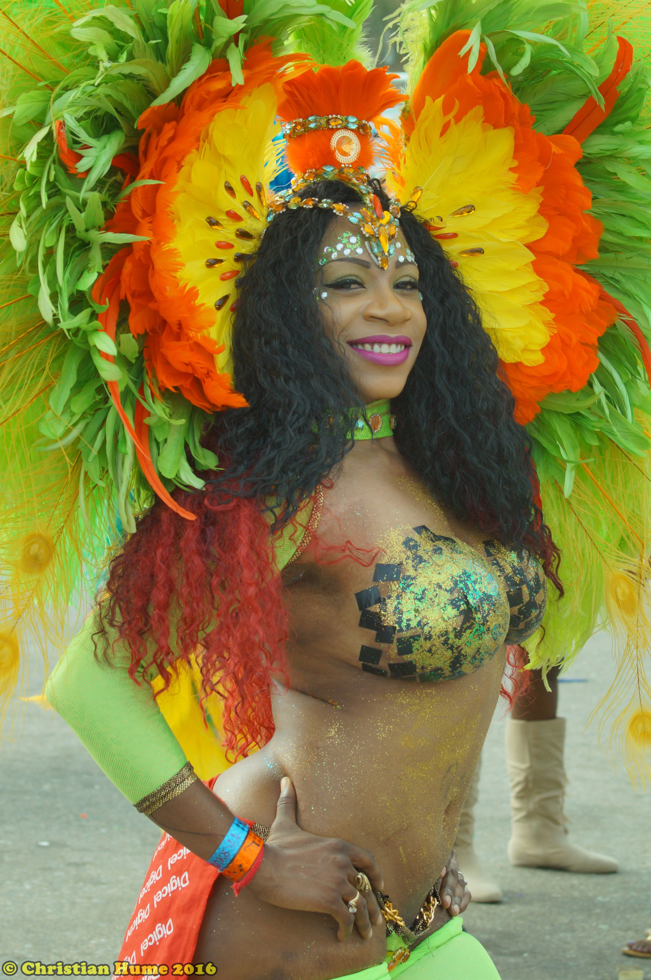 Body painted woman at the 2016 carnival in Port of Spain, Trinidad. Via Portrito.