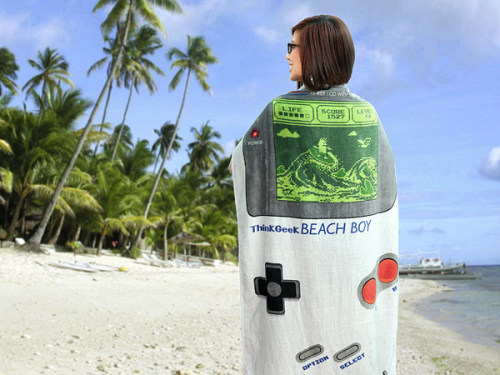 gamefreaksnz:  ThinkGeek Beach Boy Towel US ร.99  With your Beach Boy Towel from ThinkGeek, you can tell the world that you’d rather be gaming. In fact, after you take a swim, you’re going to find some shade, carefully dry off your hands, grab your