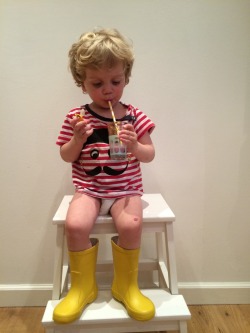 Asger loves his new yellow boots