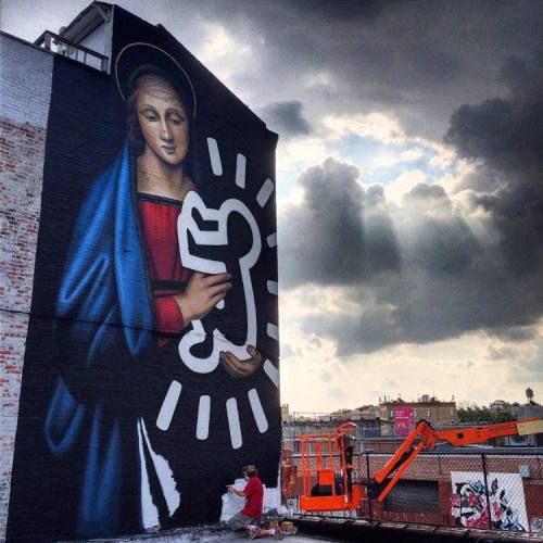 christiannightmares:Just a giant mural of the Virgin Mary cradling a Keith Haring figure in Brooklyn