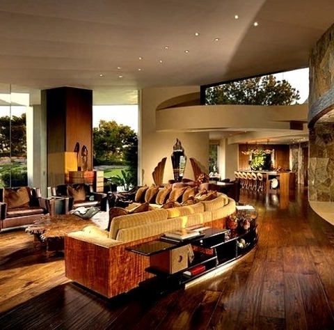 Great Room - Rustic Dining RoomInspiration For A Large Rustic Medium Tone Wood Floor Great Room Remodel