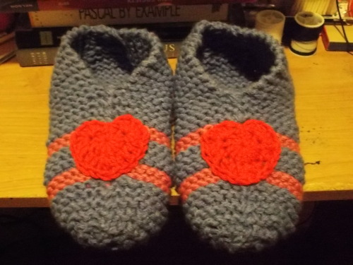 i knit these slippers for my moirail for christmas! as soon as i learned how to crochet hearts i was