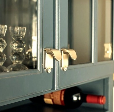 Indianapolis Home Bar GalleyAn Undermount Sink, Raised-panel Cabinets, Quartz Countertops, A White Backsplash,