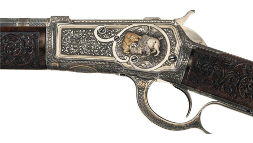 Relief carved, engraved, and gold inlaid Winchester Model 1892.from Rock Island Auctions