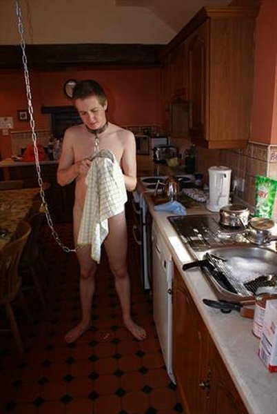 Porn photo slavematt: Chained to the beams in the kitchen,
