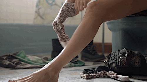 Emmy Rossum getting dressed on Shameless