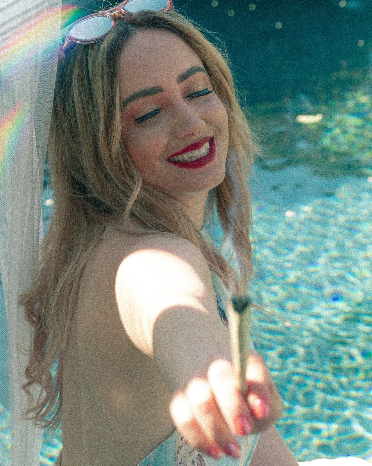 bakedlilbae:Nothing beats blunts at the pool in this 100° weather 💦📸: @rhyleephoto IG: