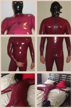 rbrlover:  Rubber gimp in dark red suit 