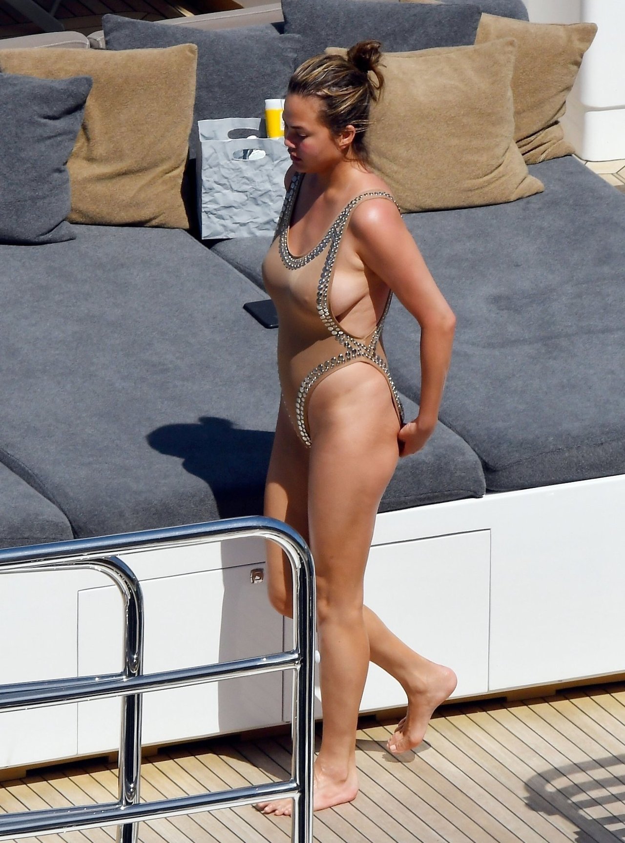 sideboobelse:  Chrissy Teigen, yacht in Corsica (August 2017)