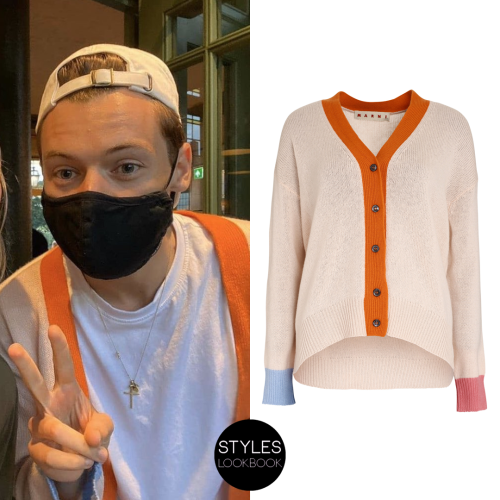 Out in London, Harry was pictured wearing a Marni cashmere cardigan. Photo by issiebee123. Marni V-n