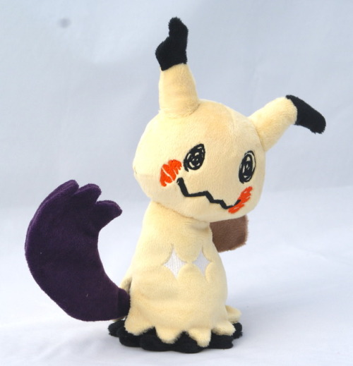 A Mimikyu plush using the move Shadow Claw, commission. Made from minky fabric and contains plastic 