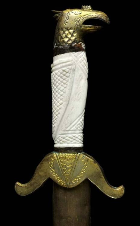 Chinese sword with eagle head hilt, late 19th or early 20th century.from Karabela Auctions