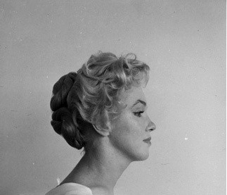 :  Marilyn Monroe photographed in 1956 © Milton Greene.   Cutie