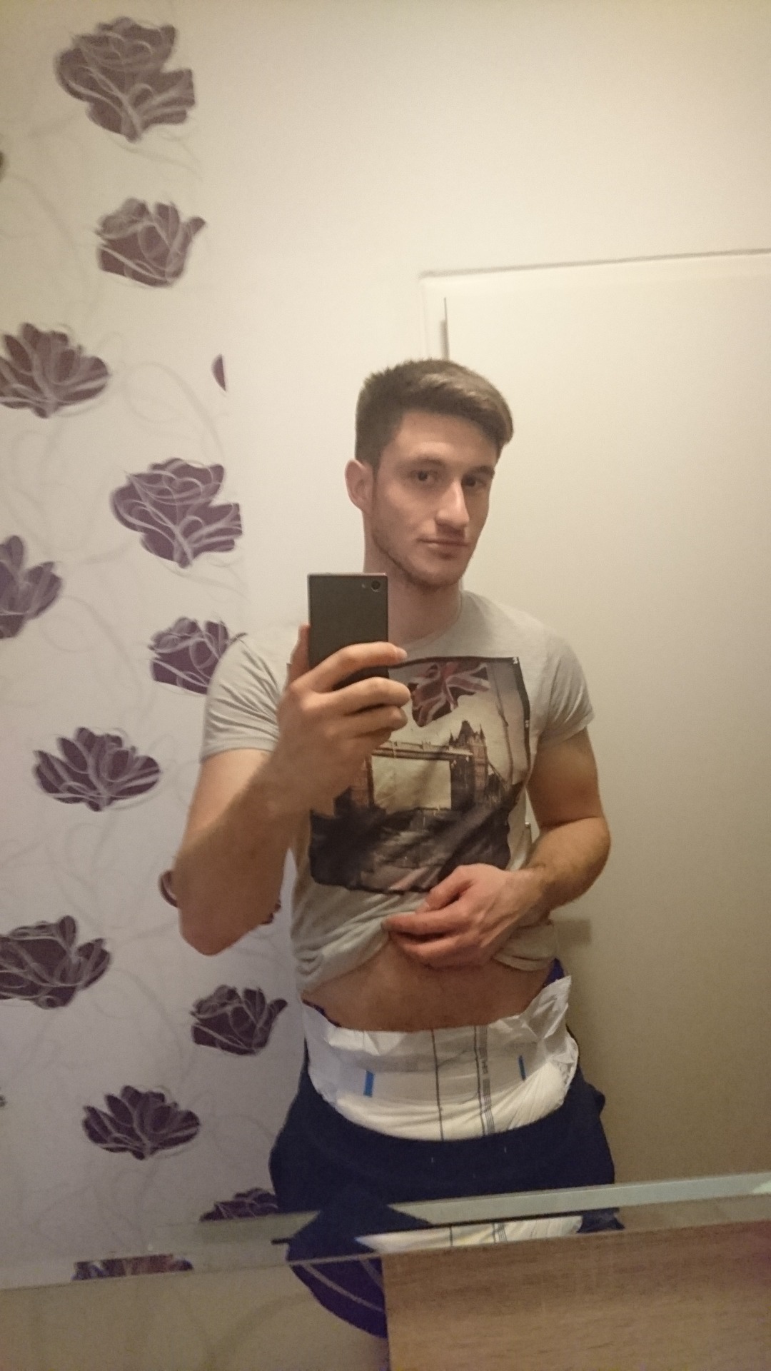 domini90:Some pictures of me i love diapers and wearing them but not only i love