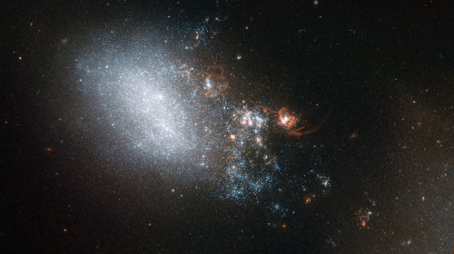 Galaxy NGC 4485 in the constellation Canes Venatici (The Hunting Dogs), warped by gravitational inte