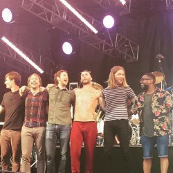 leovine:  jamesbvalentine: Not so happy to have to stand next to Adam during our bow when his shirt is off, after a particularly sweaty show. You can’t see it, but my right arm is just hovering behind trying not to make contact while saying to PJ,