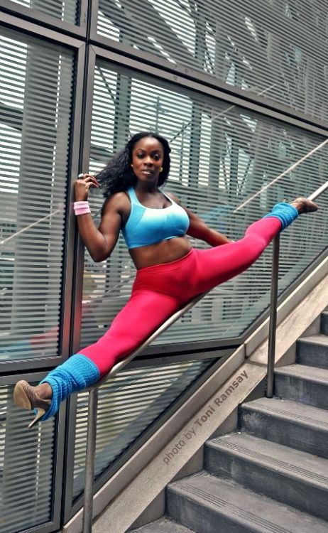 Anowa Adjah stretching on a handrail