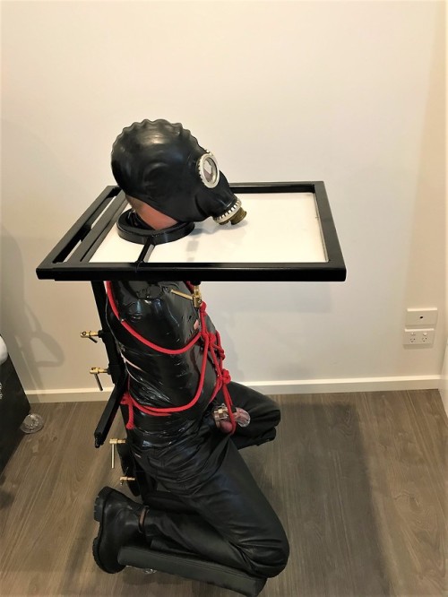 mega-kink: the fourth of my bondage table compilation, I really love my bondage table that I had made, I particularly enjoy side shots of it, showing that fags locked in it, are in a sort of mobile kneeling position.
