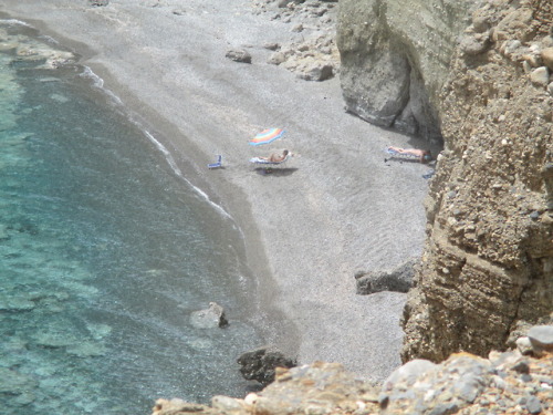 This lonely nudist couple enjoys secluded Galini beach (Ahlia) near Agia fotia (south of  Crete)This