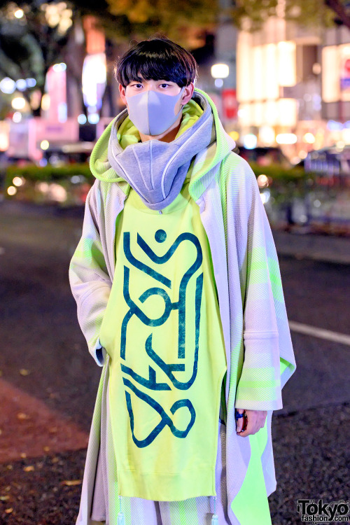 tokyo-fashion:20-year-old student Ren on the street in Harajuku wearing a matching neon hoodie, coat