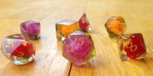 peppapigvevo: battlecrazed-axe-mage: I had to grab this gorgeous custom dice set off Etsy, each one 