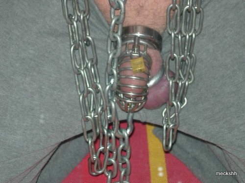 jockpig:  fucking hot…heavy chains on titts…cock in steelcage…balls weighted…I