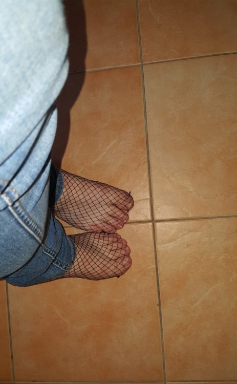 My feet in fishnets after 10 hours in sneakers