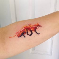 tattoofilter:  Watercolor style fox tattoo on the left forearm. Tattoo artist: Adrian Bascur
