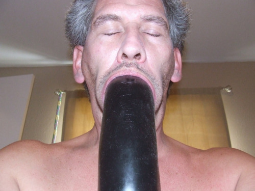 Giant black dildo throat fucking  I have posted a couple of hot dildo deep throating videos recently, and thought I would re-post these impressive massive dildo sucking pics…