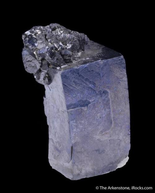 Double sulphideSitting atop a sizeable oblong crystal of the common lead sulphide mineral galena (se