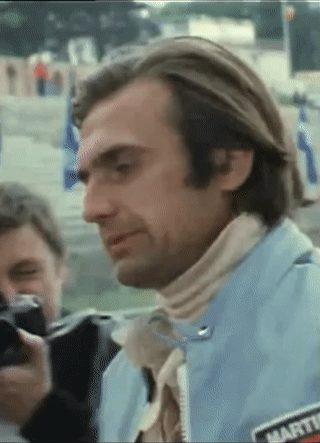 Carlos Reutemann Talking To Emerson Fittipaldi At The 1975 Belgian Grand Prix