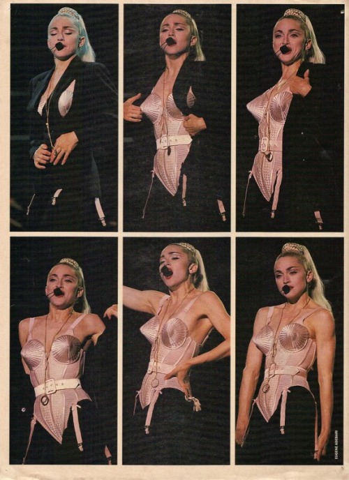 madonnascrapbook:Madonna undresses during Express Yourself at her Blond Ambition tour 1990.