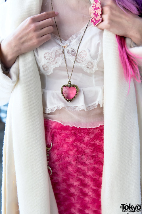 Manon on the street in Harajuku wearing a Nice Claup coat over a vintage camisole top, a handmade sk