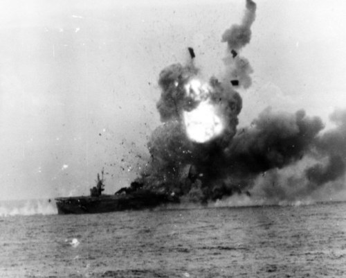 USS St. Lo (CVE-63) after getting hit by a kamikaze which detonated her torpedo and bomb magazines, 