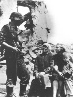 fuehrerbefehl: A Waffen-SS grenadier talking to citizens of Belgorod.